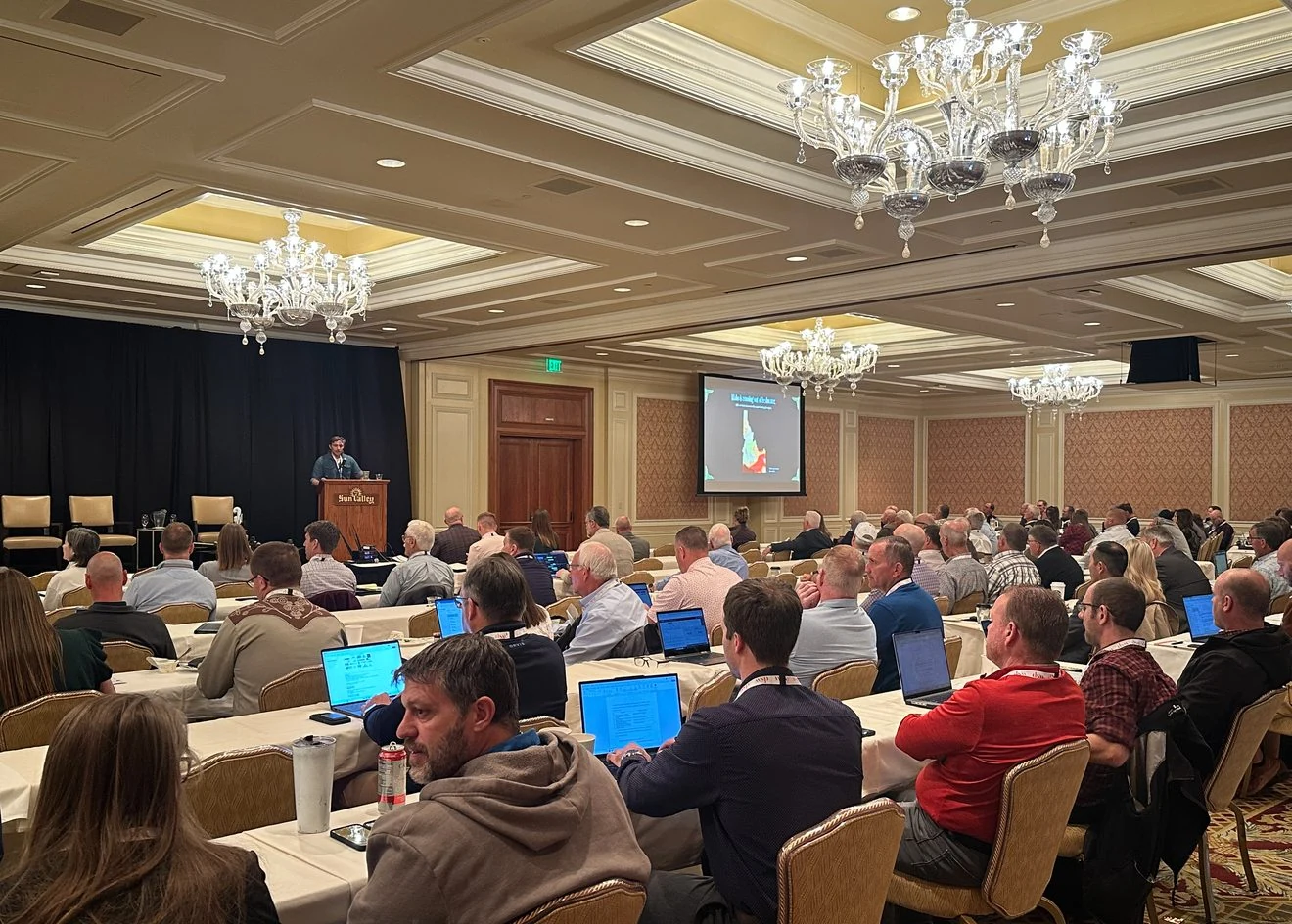 A conference hall of water users listens to a presentation at the Idaho Water Users Association Conference in Sun Valley.