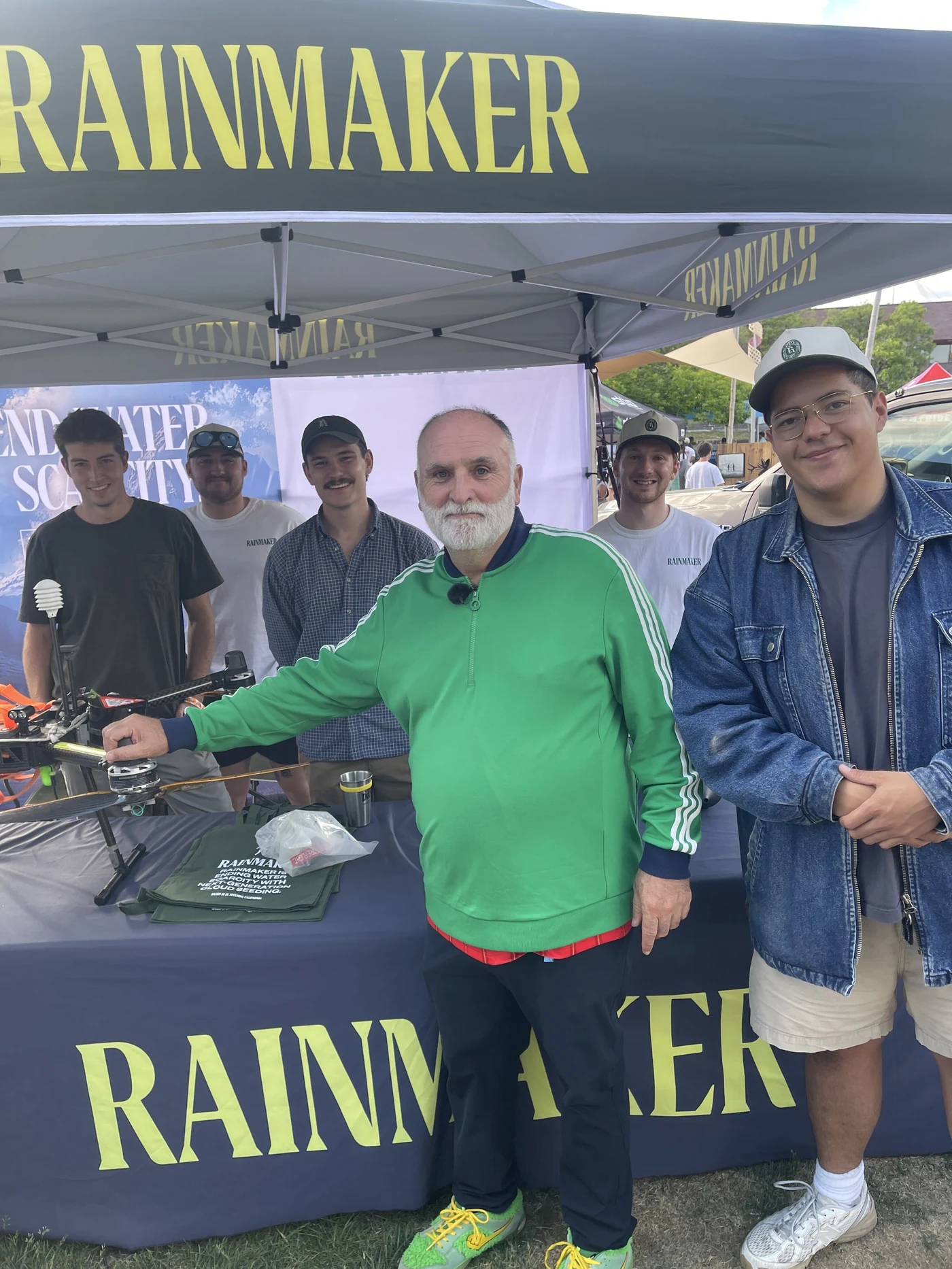 Chef Jose Andres visits the Rainmaker tent at Outside Days in Denver, a drone on the table before him.